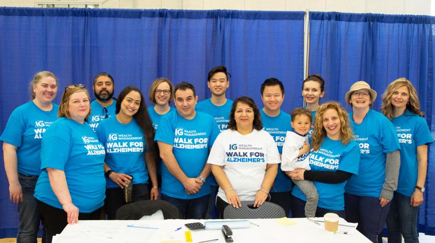 A big group of volunteers for the Walk gathered together and posing.