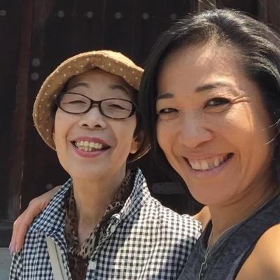 Masami and Masako smiling together.