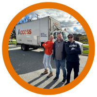 Three men standing in front of Access Shred Truck
