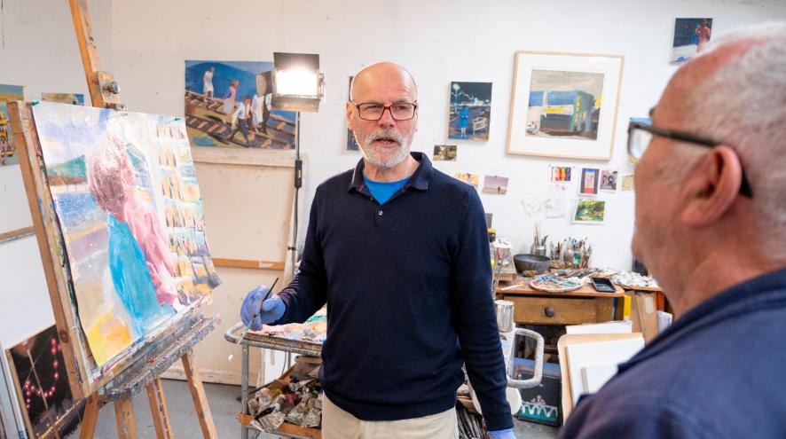 Two men in a painting class